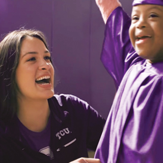 TCU Volleyball player Anna Walsh at KinderFrogs graduation