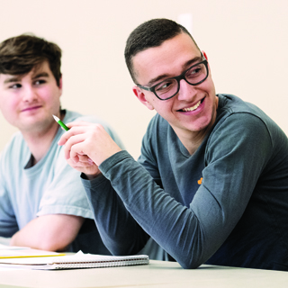 Two male students in class