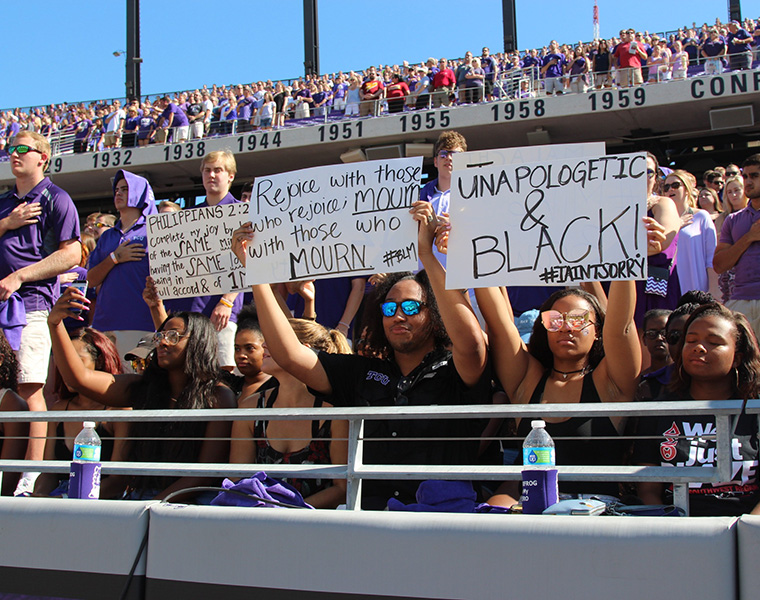 A group of TCU students participated in a silent demonstration during the National Anthem.